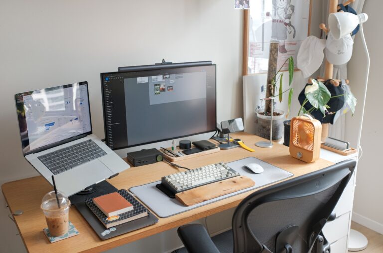 Under Desk Cable Management Tray: 7 Best Ways to Organize Your Wires 5 Under desk cable management tray setup on a clean wooden desk with dual monitors and keyboard